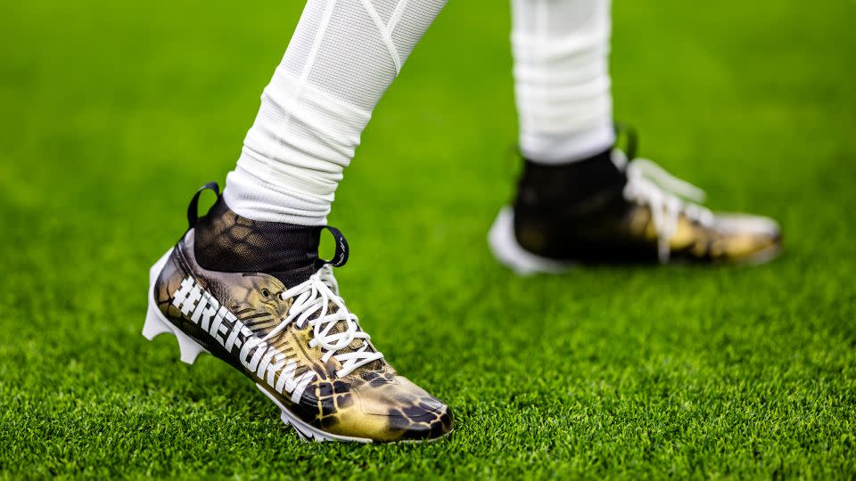 A picture of Stroud's cleats with the word 'REFORM' emblazoned on them. - Houston Texans