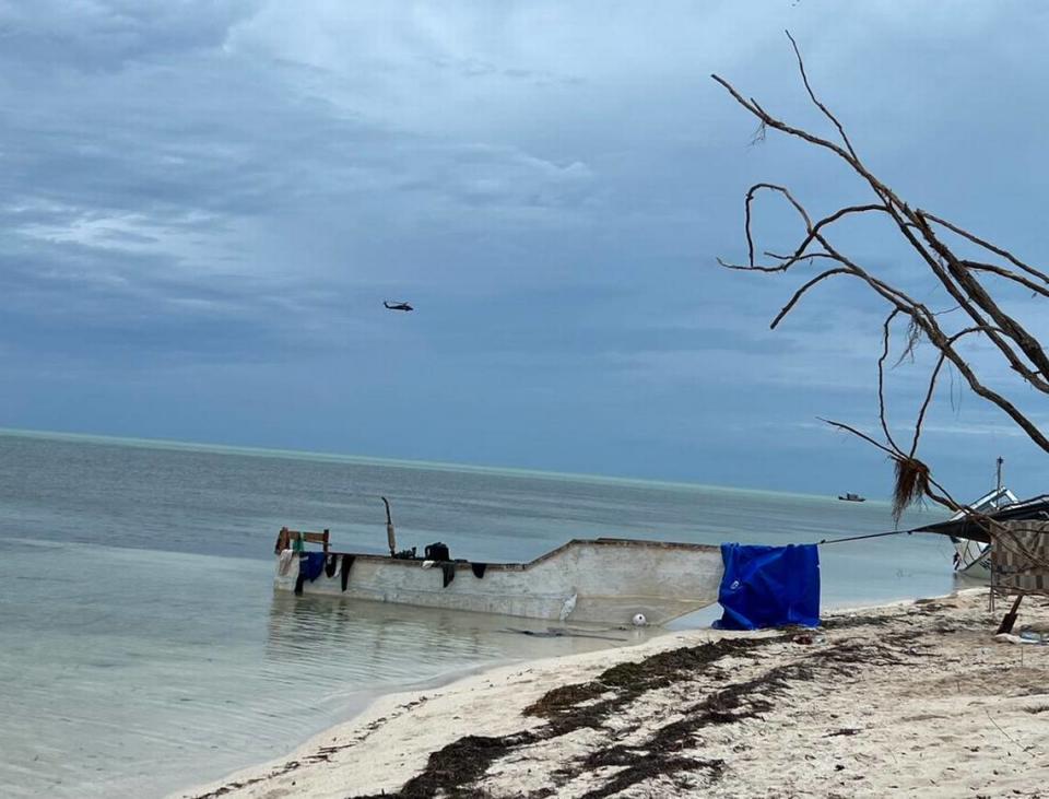 Cuban migrant boats are tied to trees on a beach in the Marquesas in the Lower Florida Keys Wednesday, Oct. 19, 2022.