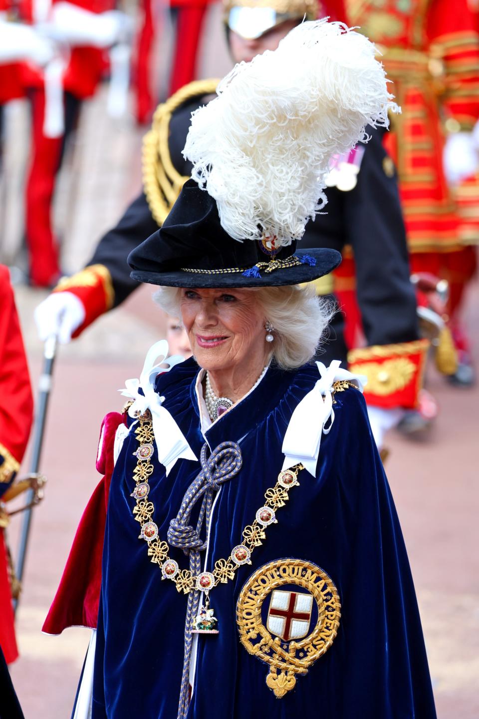 WINDSOR, ENGLAND - JUNE 17: Queen Camilla attends the Order Of The Garter Service at Windsor Castle on June 17, 2024 in Windsor, England. The Order of the Garter, Britain's oldest chivalric order established by Edward III, includes The King, Queen, Royal Family members, and up to 24 companions honoured for their public service. Companions of the Garter are chosen personally by the Sovereign to honour those who have held public office, who have contributed in a particular way to national life or who have served the Sovereign personally. (Photo by Chris Jackson - WPA Pool/Getty Images)