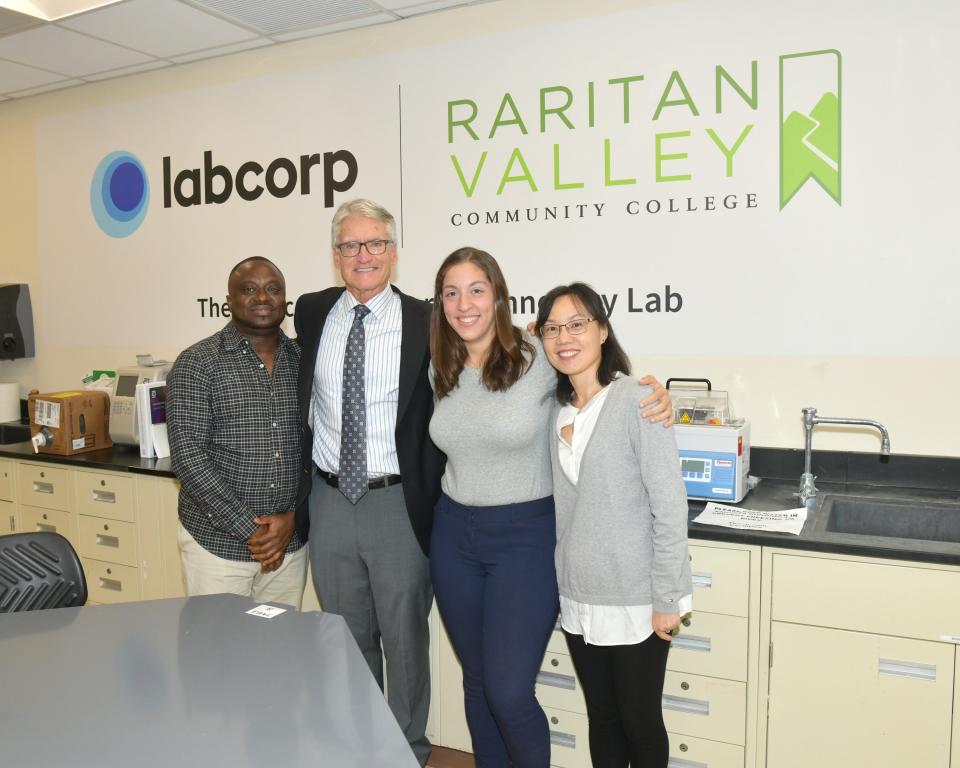 Mike Marion, executive director of the RVCC Foundation, second from left, with the first three recipients of the Labcorp MLT Scholarship at Raritan Valley Community College, from left, Essa Conteh, Laura Bacino and Qunying Zhao.