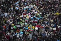 FILE - Pro-democracy protesters take part in a march in Hong Kong, Sunday, Dec. 8, 2019. The recent wave of protests against China's anti-virus restrictions was a ray of hope for some supporters of Hong Kong's own pro-democracy movement after local authorities stifled it using a national security law enacted in 2020, but not everyone agrees. (AP Photo/Kin Cheung, File)