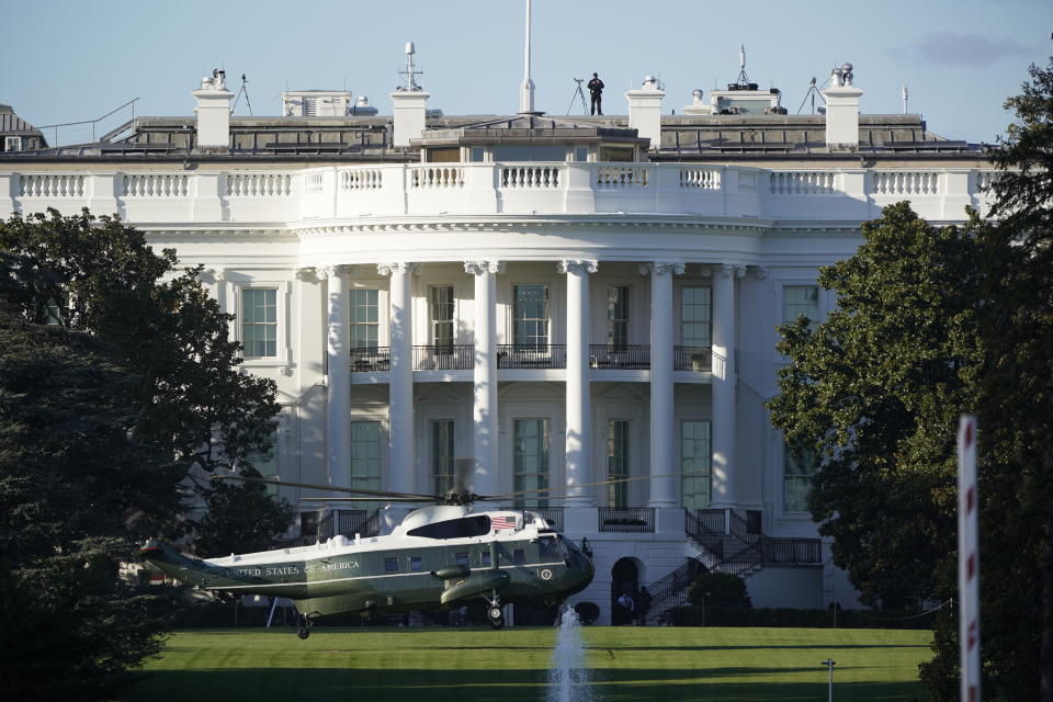 The helicopter that will carry President Donald Trump to Walter Reed National Military Medical Center in Bethesda, Md., lands on the South Lawn of White House in Washington, Friday, Oct. 2, 2020. The White House says Trump will spend a "few days" at the military hospital after contracting COVID-19. (AP Photo/J. Scott Applewhite)