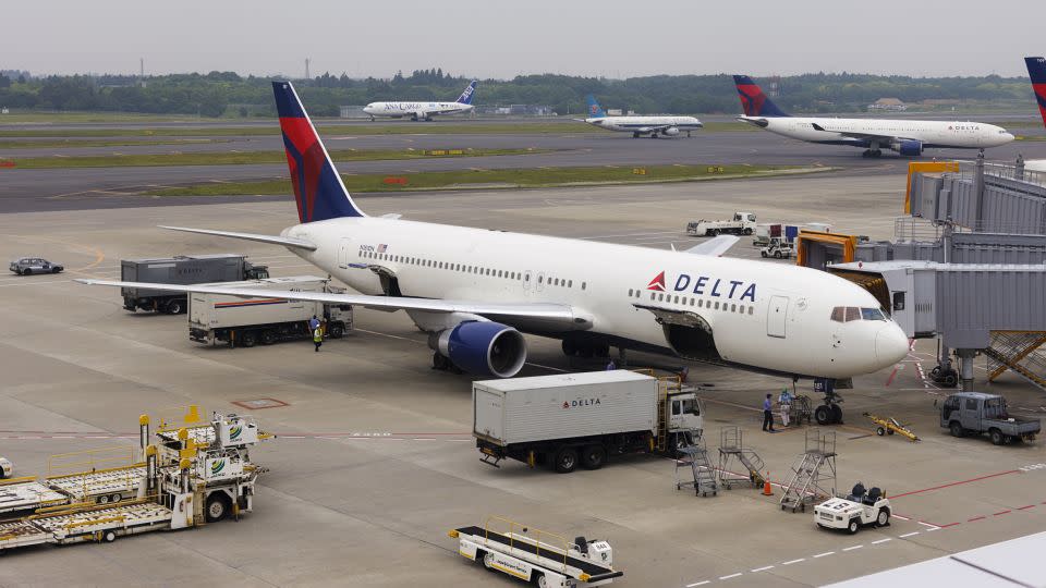 A number of Delta credit cards give card members complimentary checked bags. - Rich Legg/iStock Unreleased/Getty Images