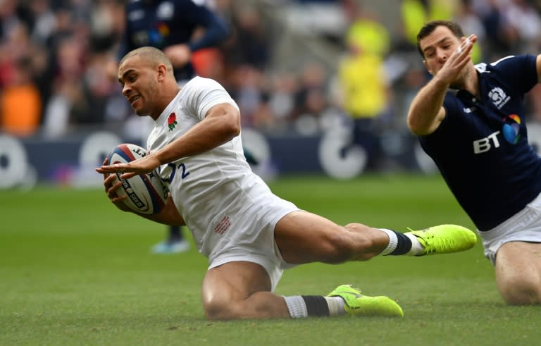 England's centre Jonathan Joseph scores his team's first try during their Six Nations international rugby union match against Scotland at Twickenham stadium in south west London on March 11, 2017