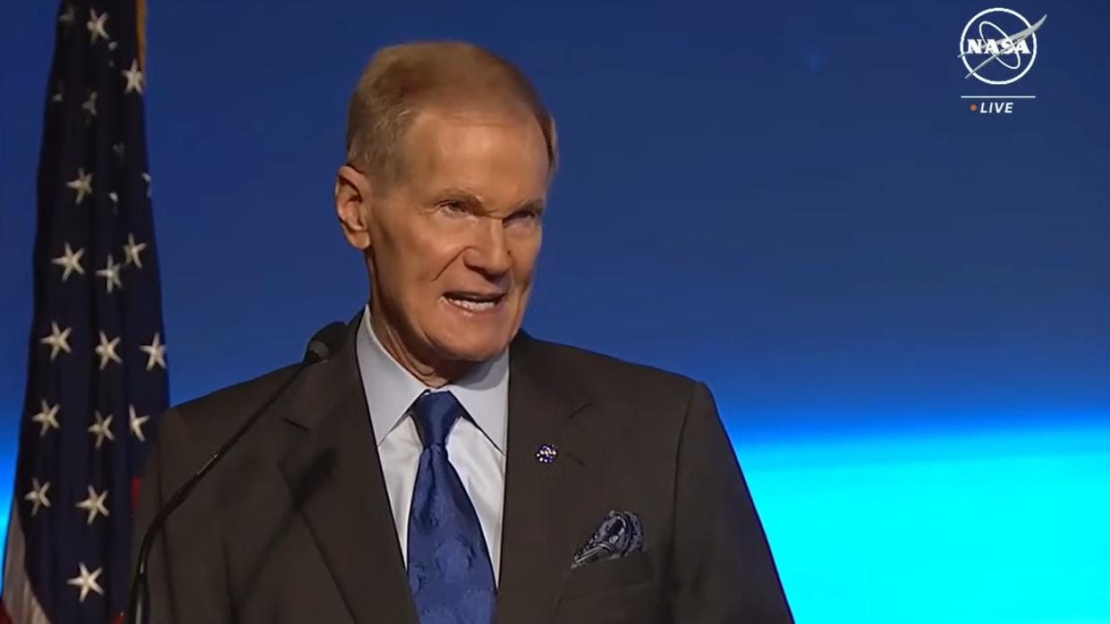  Nasa administrator bill nelson speaking in front of an american flag. 