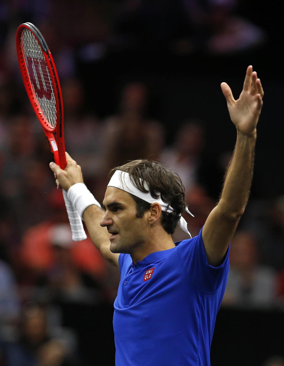 Team Europe's Roger Federer celebrates a men's singles tennis match win against Team World's John Isner at the Laver Cup, Sunday, Sept. 23, 2018, in Chicago. (AP Photo/Jim Young)