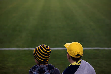 Children supporting Betar Nordia Jerusalem sit in stands during a match at Teddy Stadium in Jerusalem, January 29, 2018. REUTERS/Ronen Zvulun