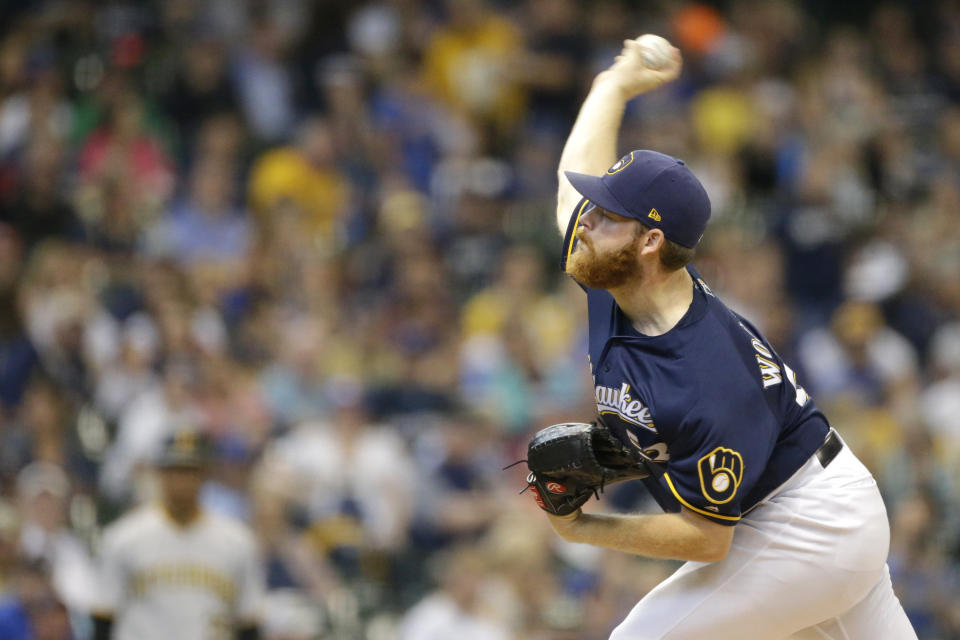 Milwaukee Brewers' Brandon Woodruff pitches during the first inning of a baseball game against the Pittsburgh Pirates, Sunday, Sept. 22, 2019, in Milwaukee. (AP Photo/Aaron Gash)