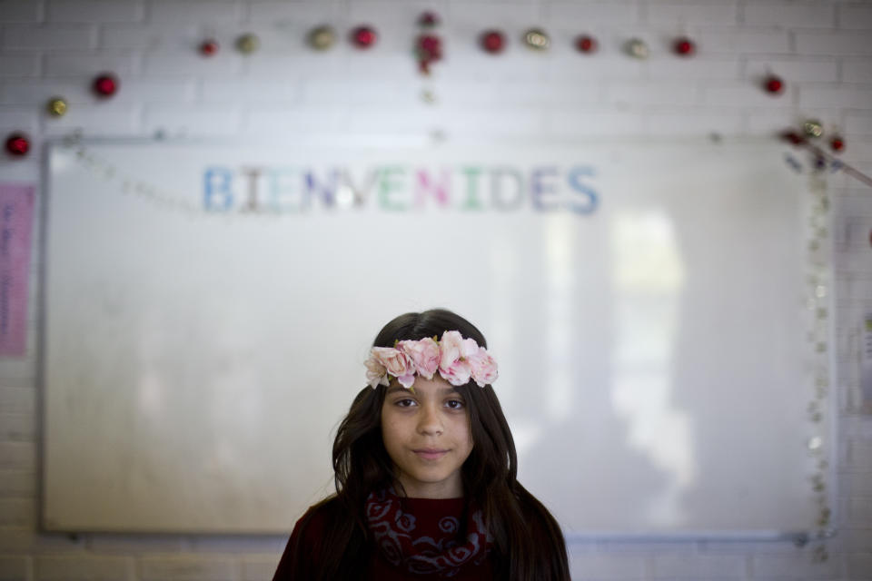 In this Dec.14, 2018 photo, Constanza, a transgender girl, poses for a photo at the Amaranta Gomez school in Santiago, Chile. Since its start, school attendance has grown from the original five students to 22 in December, and six more have already enrolled for this year. (AP Photo/Esteban Felix)