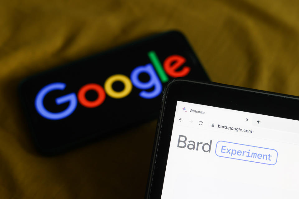 Google logo displayed on a phone screen and Bard website displayed on a laptop screen are seen in this illustration photo taken in Krakow, Poland on March 21, 2023. (Photo by Jakub Porzycki/NurPhoto)