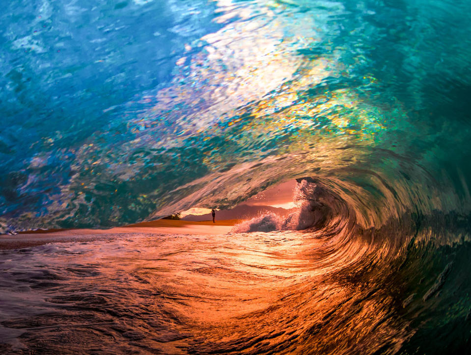 Smooth waves bursting with color give inside view of surfer’s paradise