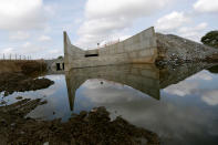 <p>Part of a construction project to divert the Sao Francisco River to relieve Campina Grande and other cities is shown at the entrance to the city of Monteiro, Paraiba state, Brazil, Feb. 9, 2017. (Photo: Ueslei Marcelino/Reuters) </p>