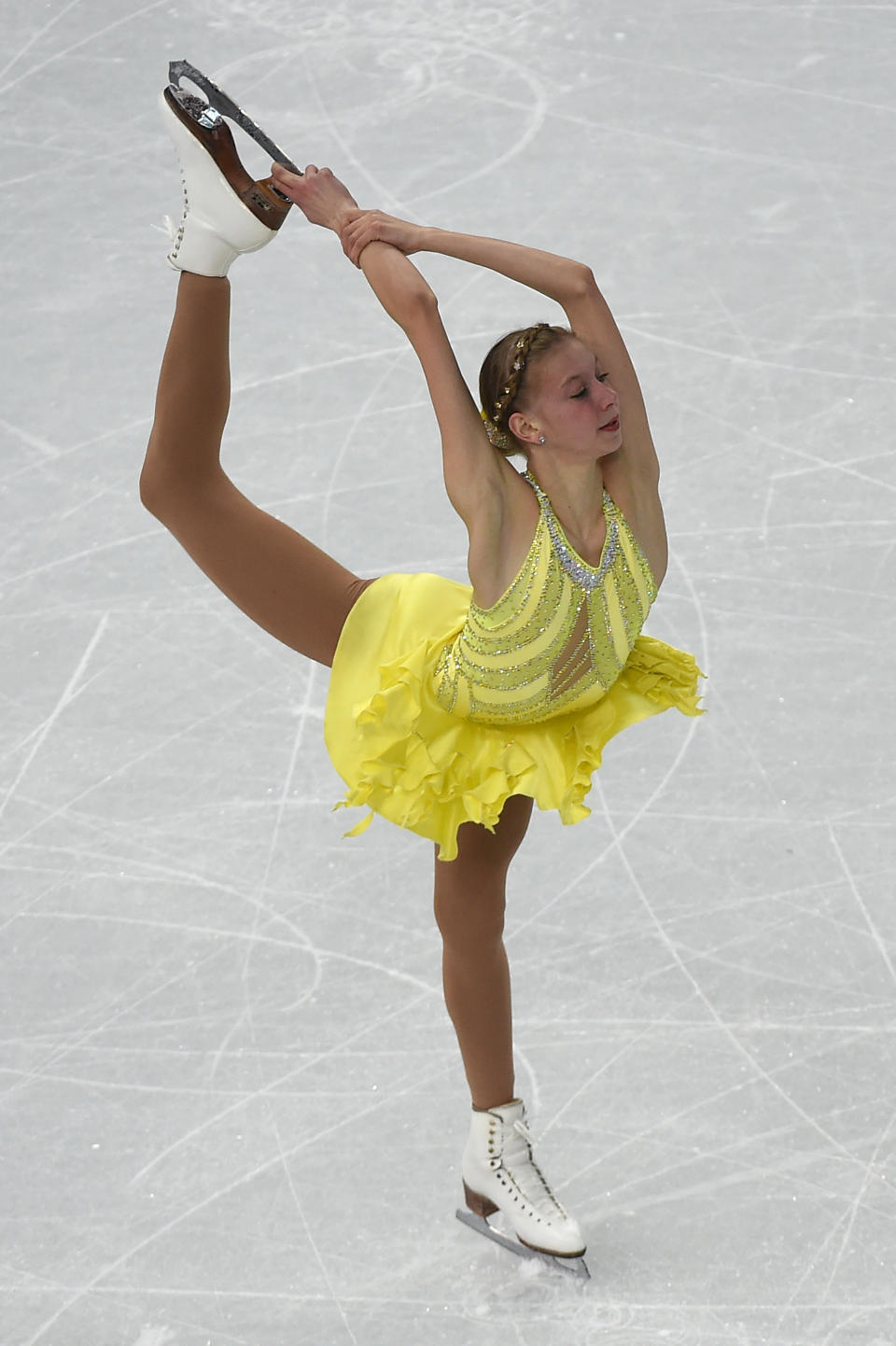 <p>Polina Edmunds’ unitard had it all – bright colors, big gems, sheer paneling. The 2014 Olympian has consistently gone bold with her outfits at skating competitions including this purple number and a bright yellow dress in Sochi. </p>