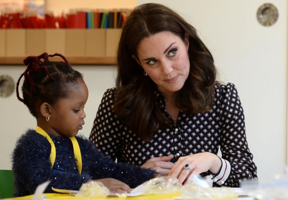 Kate met kids at a London museum on Tuesday and commented on Meghan and Harry's engagement. Photo: Getty