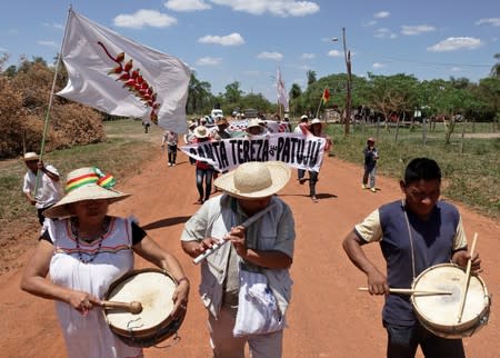 People march during the 10th Indigenous March to defend Mother Earth near San Jose