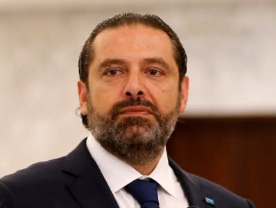 FILE PHOTO: Lebanese Prime Minister-designate Saad al-Hariri gestures as he speaks at the presidential palace in Baabda, Lebanon September 3, 2018. REUTERS/Mohamed Azakir/File Photo