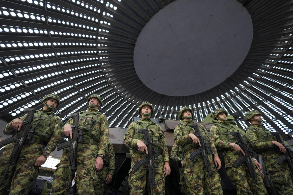 Soldiers stand at the 11th International Armament and Military Equipment Fair – PARTNER 2023, in Belgrade, Serbia, Monday, Sept. 25, 2023. (AP Photo/Darko Vojinovic)