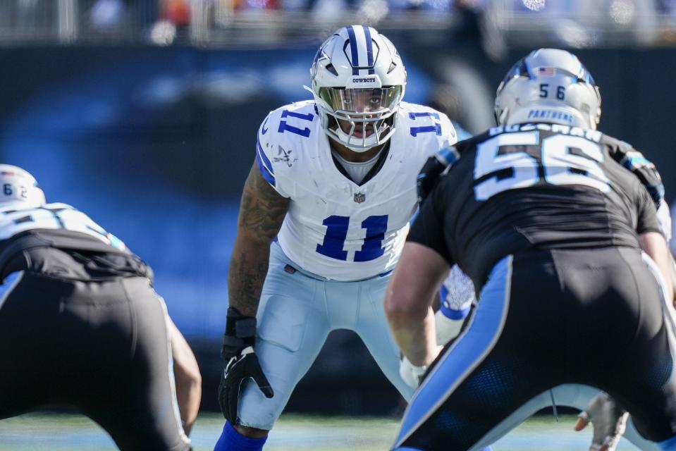 Dallas Cowboys linebacker Micah Parsons (11) eyes the offense during the second quarter against the <a class="link " href="https://sports.yahoo.com/nfl/teams/carolina/" data-i13n="sec:content-canvas;subsec:anchor_text;elm:context_link" data-ylk="slk:Carolina Panthers;sec:content-canvas;subsec:anchor_text;elm:context_link;itc:0">Carolina Panthers</a> at Bank of America Stadium. Mandatory Credit: Jim Dedmon-USA TODAY Sports