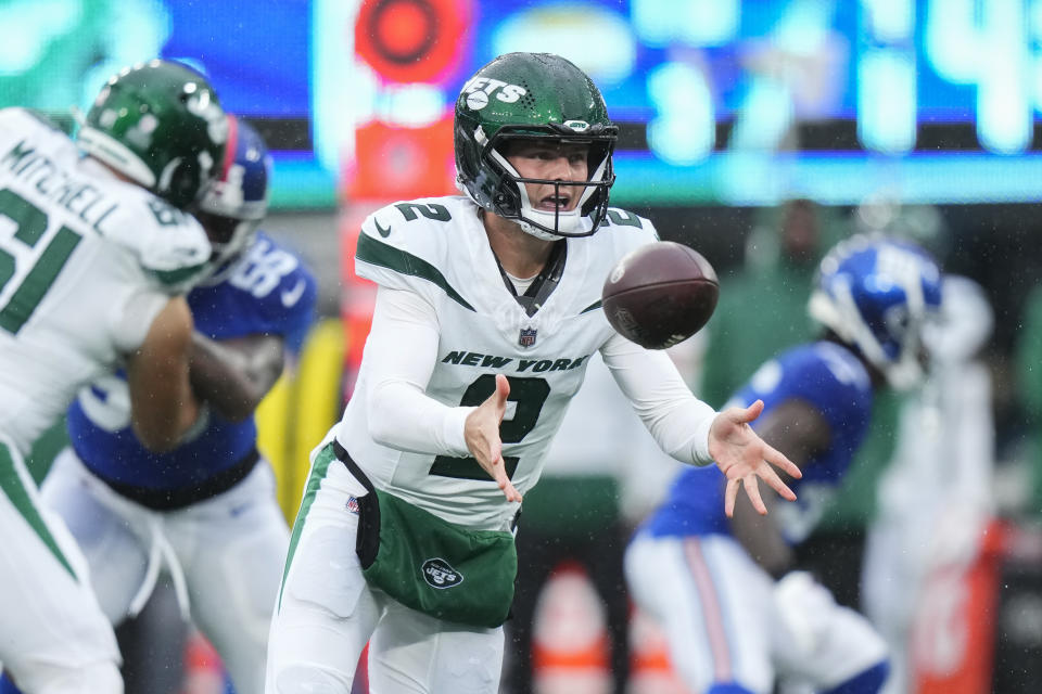 New York Jets quarterback Zach Wilson (2) tosses the ball during the first half of an NFL football game, Sunday, Oct. 29, 2023, in East Rutherford, N.J. (AP Photo/Frank Franklin II)