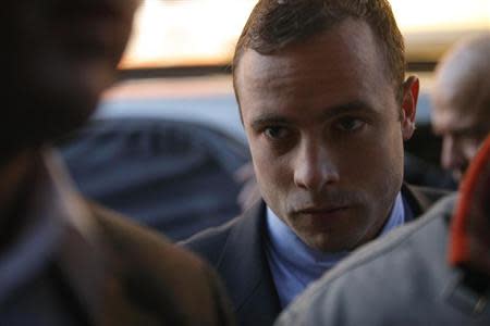 Oscar Pistorius arrives at the Pretoria Magistrates court for a brief appearance