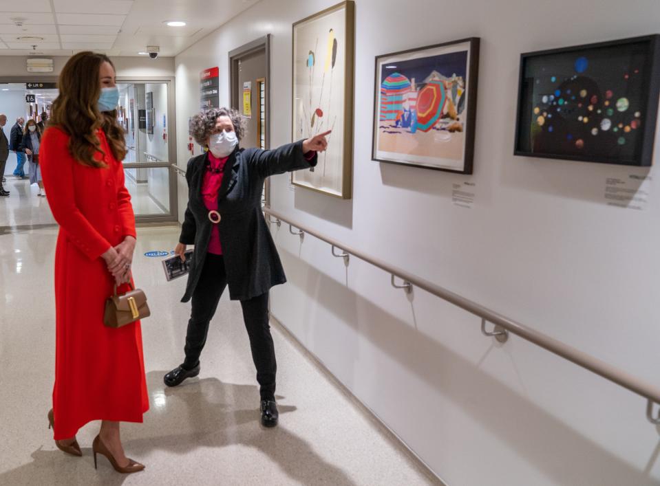 Duchess Kate of Cambridge is shown artwork on display at the Royal London Hospital in London, May 7, 2021.  The hospital uses art to benefit its staff and patients.