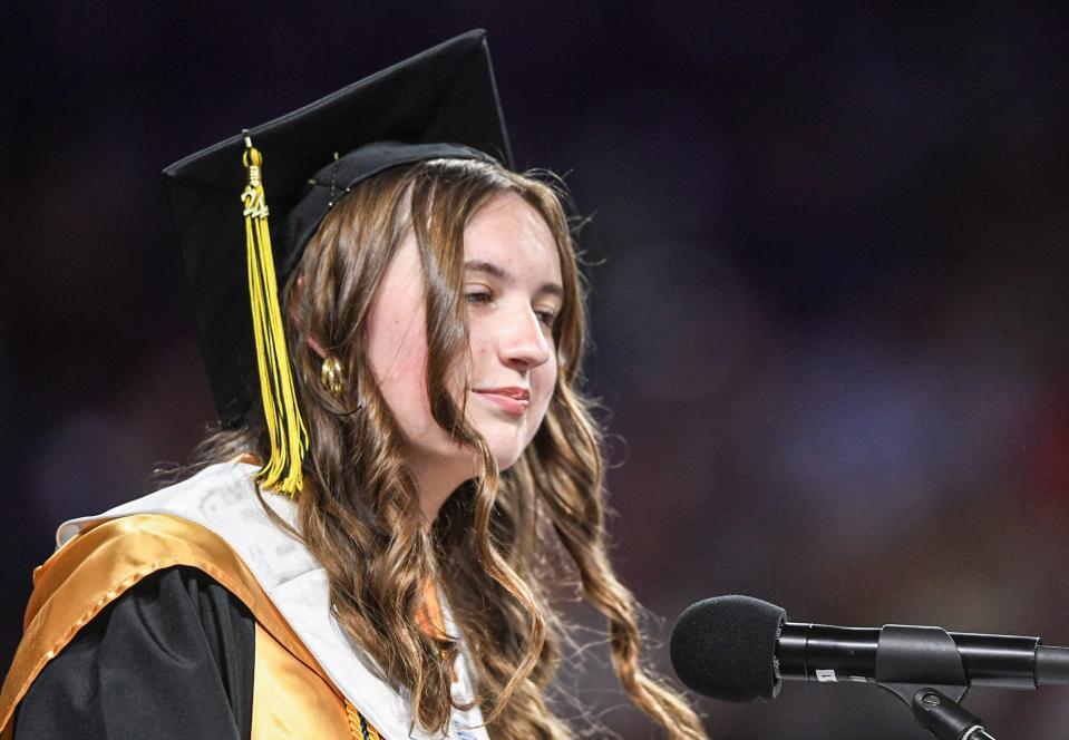 Valedictorian Hannah Elizabeth Rae speaks during the 2024 ceremony for Pendleton High School in Littlejohn Coliseum in Clemson, S.C. Tuesday, May 21, 2024.