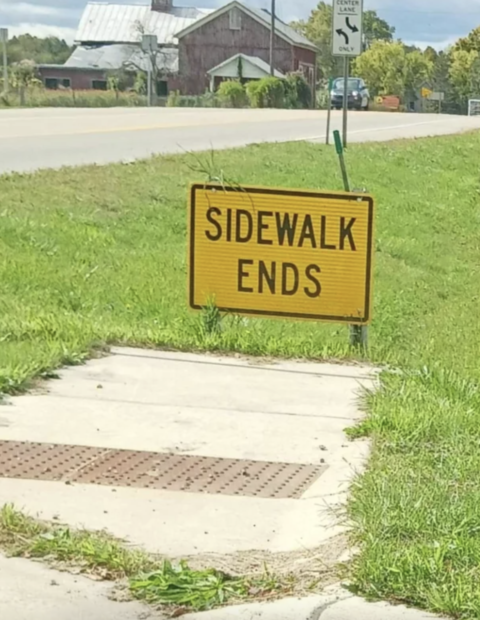 sidewalk ends sign at the end of the sign
