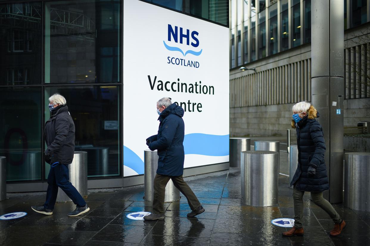 Members of the over-70s arrive at the EICC to receive their first dose of coronavirus vaccination on Feb. 1, 2021, in Edinburgh, Scotland.