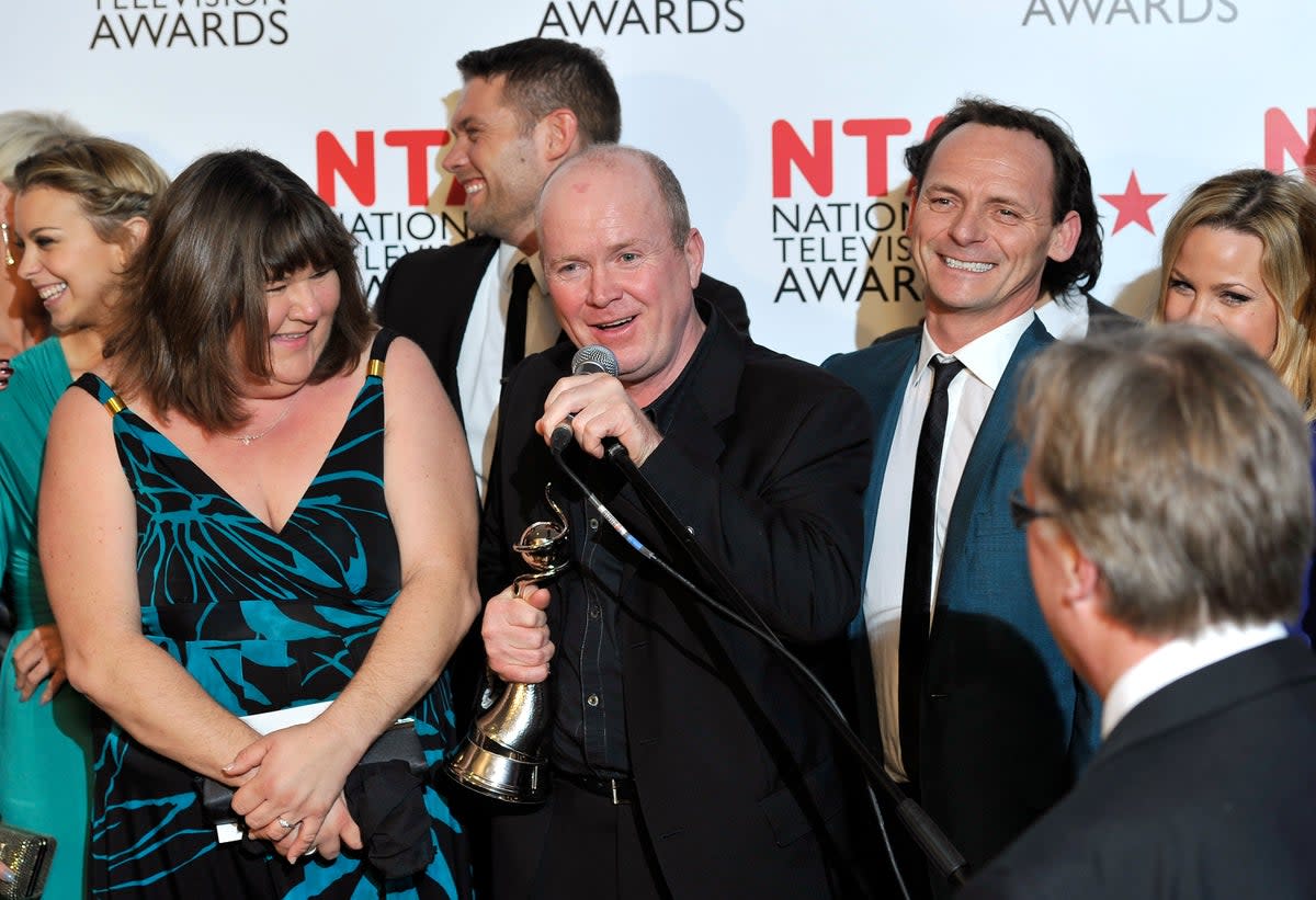 Actor Steve McFadden (C) and the cast of Eastenders with their Most Popular Serial Drama award during the National Television Awards at the O2 Arena on January 26, 2011 in London, England (Getty Images)