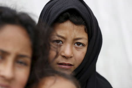 A Syrian refugee child is pictured inside an informal settlement in Taanayel, Bekaa valley, Lebanon January 6, 2016. REUTERS/Jamal Saidi