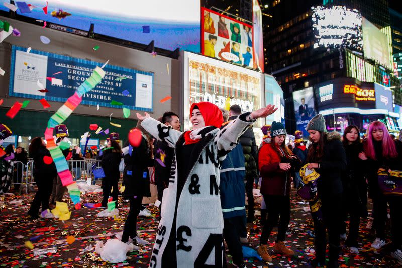 A woman celebrates the New Year in New York