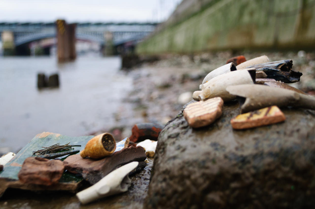 Close up of objects found while mudlarking on the River Thames