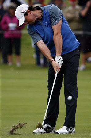 Northern Ireland's Rory McIlroy hits an iron shot on the ninth hole during the second round of the Australian Open golf tournament at Royal Sydney Golf Club November 29, 2013. REUTERS/David Gray