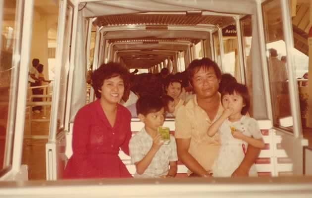 Chew (second from L) with his parents and younger sister when he was young (Photo courtesy of Dennis Chew)