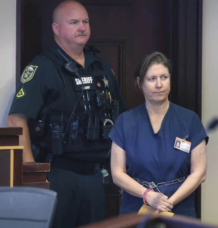 Defendant Sarah Boone leaves the courtroom during a pre-trial hearing in Orlando, Fla., Friday,