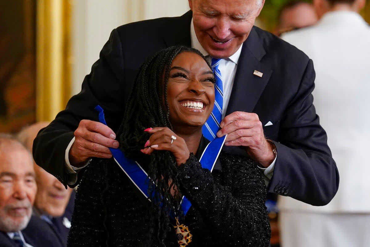 President Joe Biden awards the nation's highest civilian honor, the Presidential Medal of Freedom, to Simone Biles at the White House in Washington, Thursday, July 7, 2022. (AP Photo/J. Scott Applewhite) (AP)