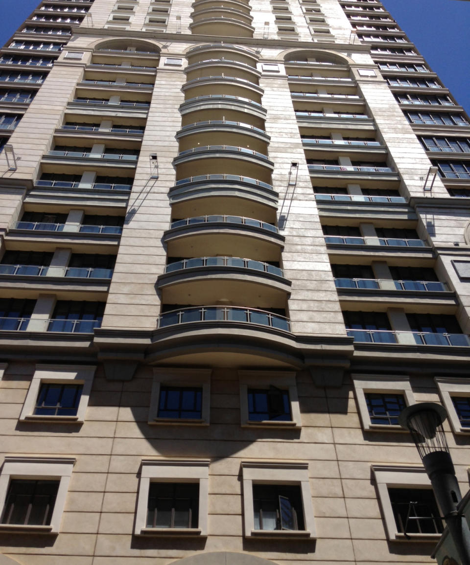 The Michelangelo Towers hotel in Sandton, Johannesburg, Thursday, Jan. 2, 2014. Rwanda’s former spy chief Patrick Karegeya was found dead, possibly strangled, in his room at the hotel, police said Thursday, and opposition leaders immediately accused Rwandan President Paul Kagame of ordering his assassination. (AP Photo/Denis Farrell)