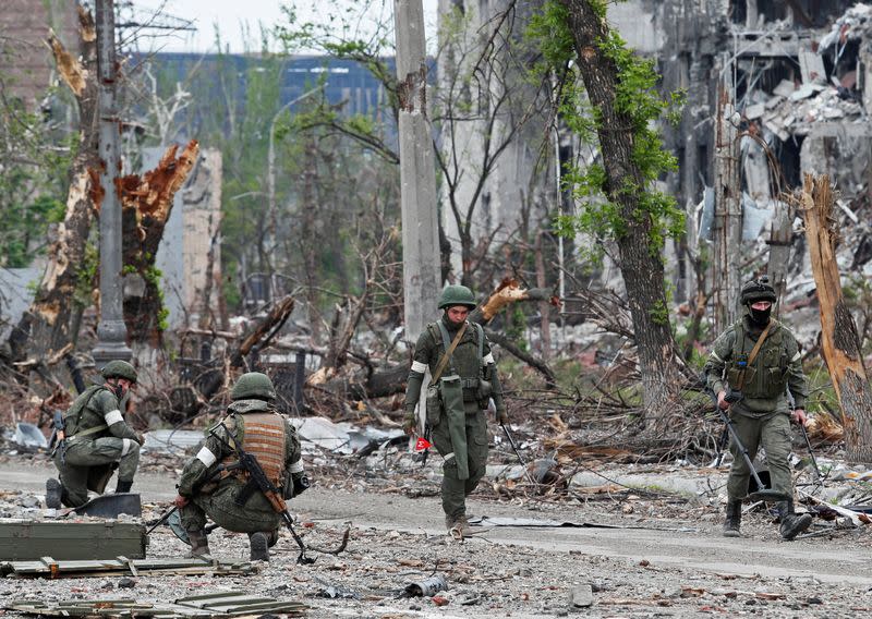 Russian service members demine the territory of Azovstal steel plant in Mariupol