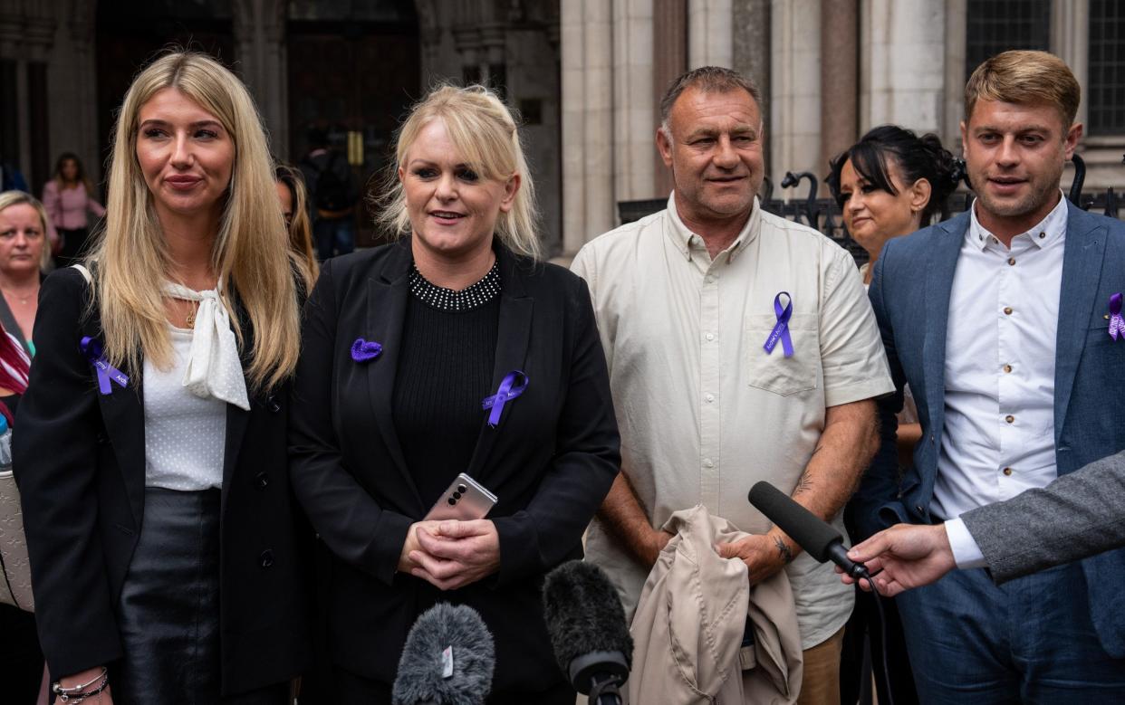 Hollie Dance and Paul Battersbee (centre left and right) say Archie's heart is still beating and want treatment to continue - Carl Court/Getty Images Europe