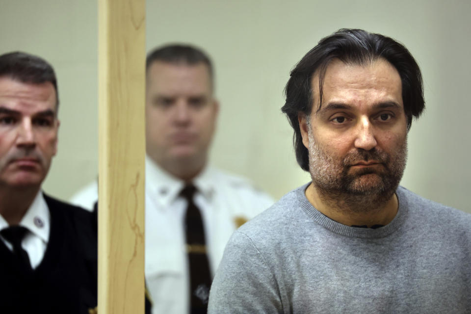 Brian Walshe, right, listens during his arraignment Wednesday, Jan. 18, 2023, at Quincy District Court, in Quincy, Mass., on a charge of murdering his wife Ana Walshe. Not guilty pleas were entered on behalf of Walshe, 47. Ana Walshe was reported missing Jan. 4, 2023 by her employer in Washington, where the couple has a home. (Craig F. Walker/The Boston Globe via AP, Pool)