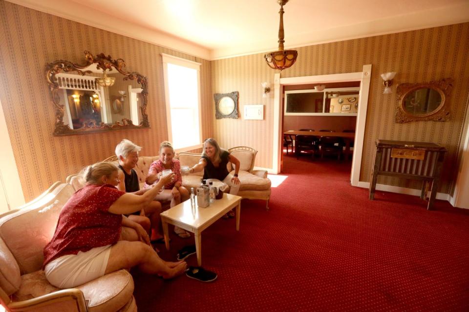 Gail Klauer, Jennifer Ingstrom, Mary Bateman and Terri LeDoux in a sitting area at the historic Niles Hotel.