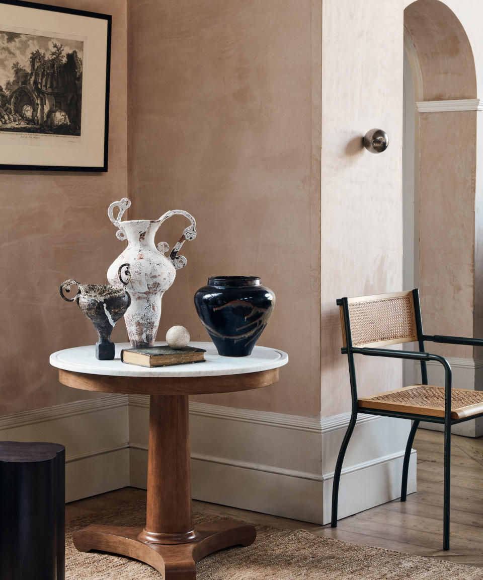 1. Use sculptural ceramics to bring a quiet corner to life