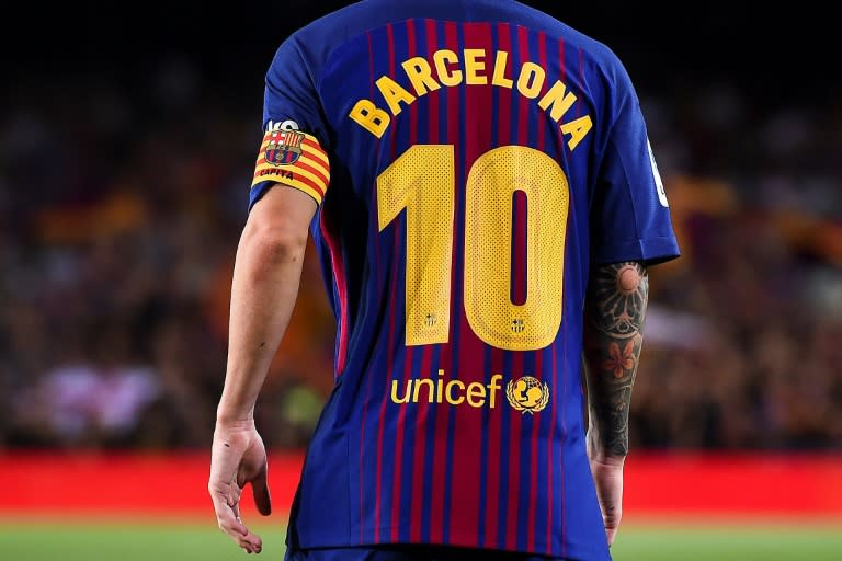 Barcelona's forward Lionel Messi wears a jersey reading "Barcelona" instead of his name on August 20, 2017