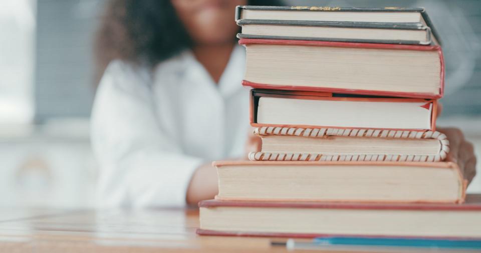 cropped shot of a young girl doing school work in a mathematics class