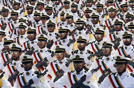 Members of the Iranian Revolutionary Guard Navy march during a parade to commemorate the anniversary of the Iran-Iraq war (1980-88), in Tehran in this September 22, 2011 file photo. REUTERS/Stringer/Files