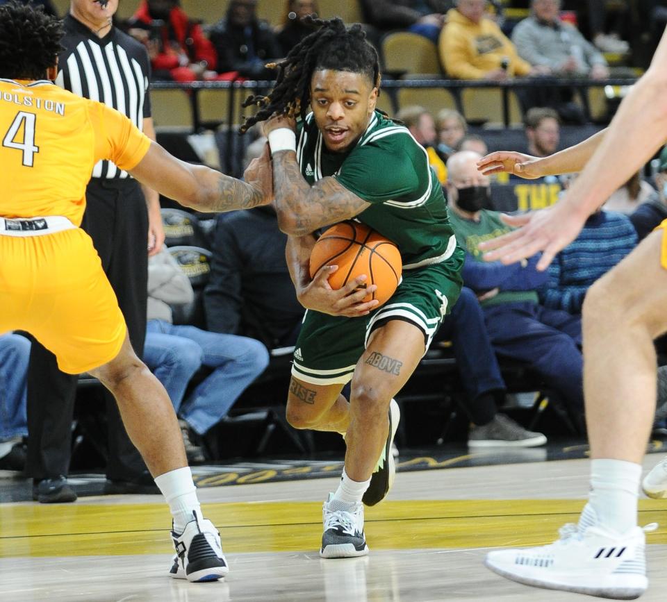 Kamari McGee heads toward the basket for UW-Green Bay during a game against UW-Milwaukee on Feb. 13. McGee is a graduate of Racine St. Catherine’s and transferred from UWGB to Wisconsin.