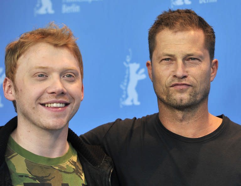 British actor Rupert Grint (L) and German actor Til Schweiger (R) pose at a photocall for the film "The Necessary Death of Charlie Countryman" during the 63rd Berlinale Film Festival in Berlin on February 9, 2013. The film drew savage reviews after screening at last month's Sundance festival but appeared to win over the more international audience in Berlin, where it drew enthusiastic applause