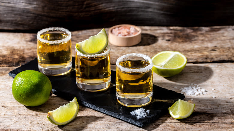 line of amber tequila shots