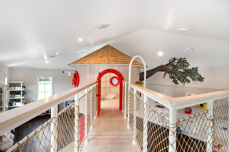 Faux tree house in child's playroom.