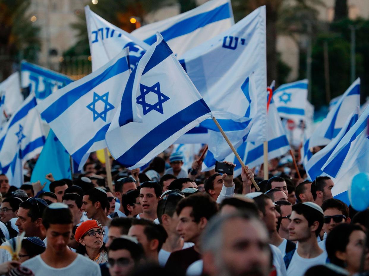 Far-right Israeli nationalists demonstrate in Jerusalem's Old City to commemorate Jerusalem Day, marking the establishment of Israeli control over the Old City following its capture in the Six-Day War of 1967: AFP